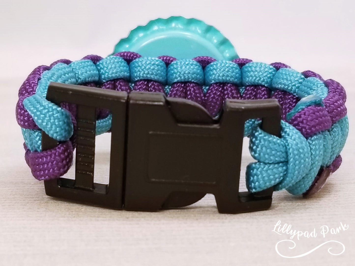 Handmade and hand braided paracord bracelet with bottle cap pendent