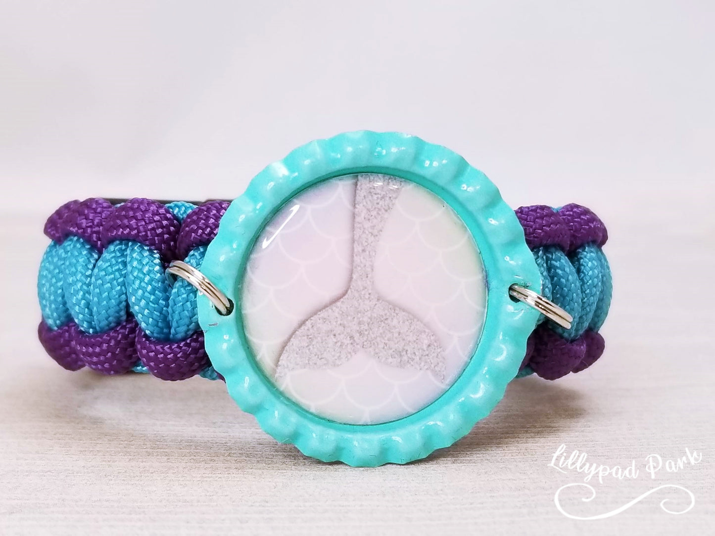 Handmade and hand braided paracord bracelet with bottle cap pendent