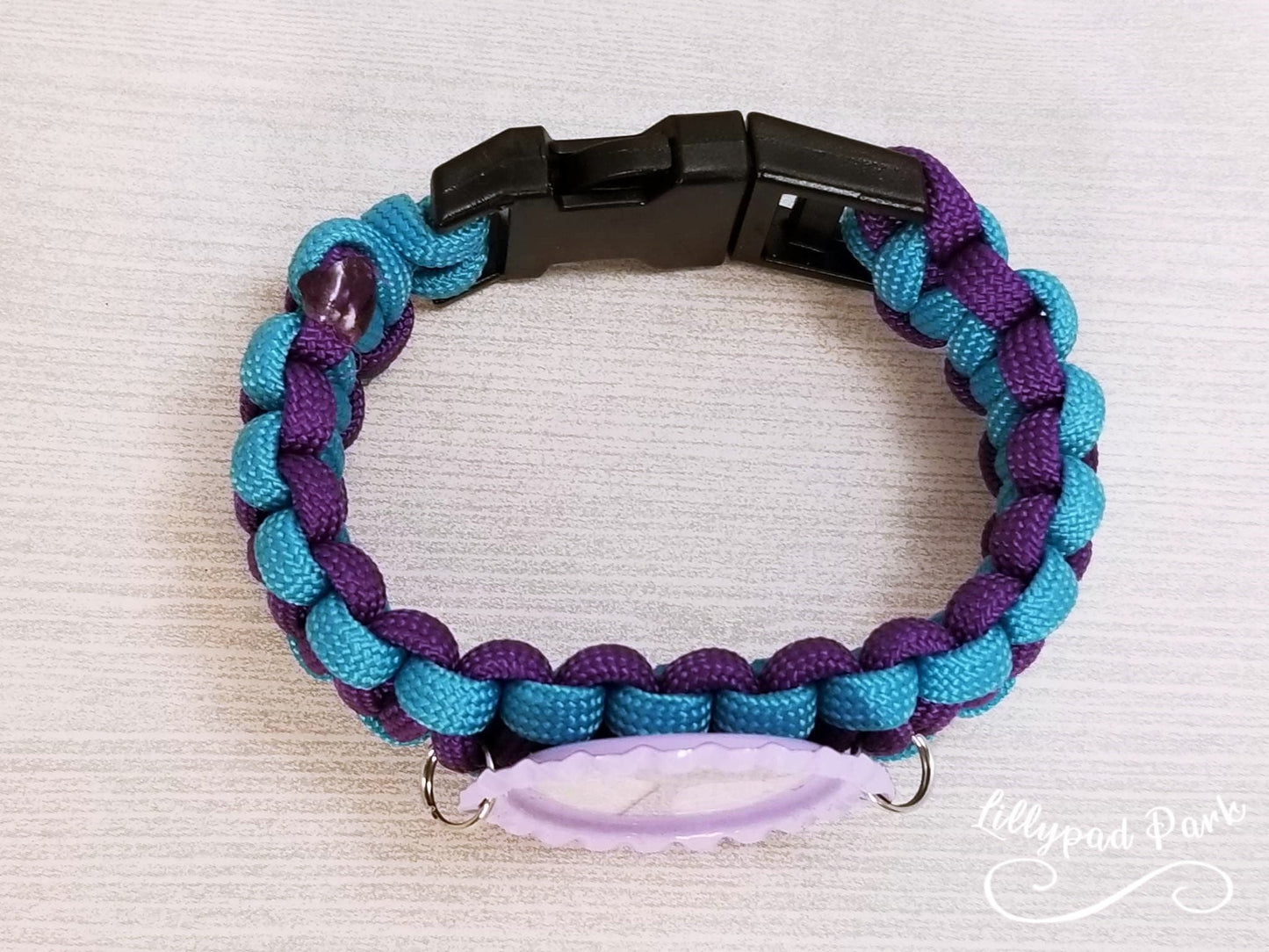 Handmade and hand braided paracord bracelet with bottle cap pendent