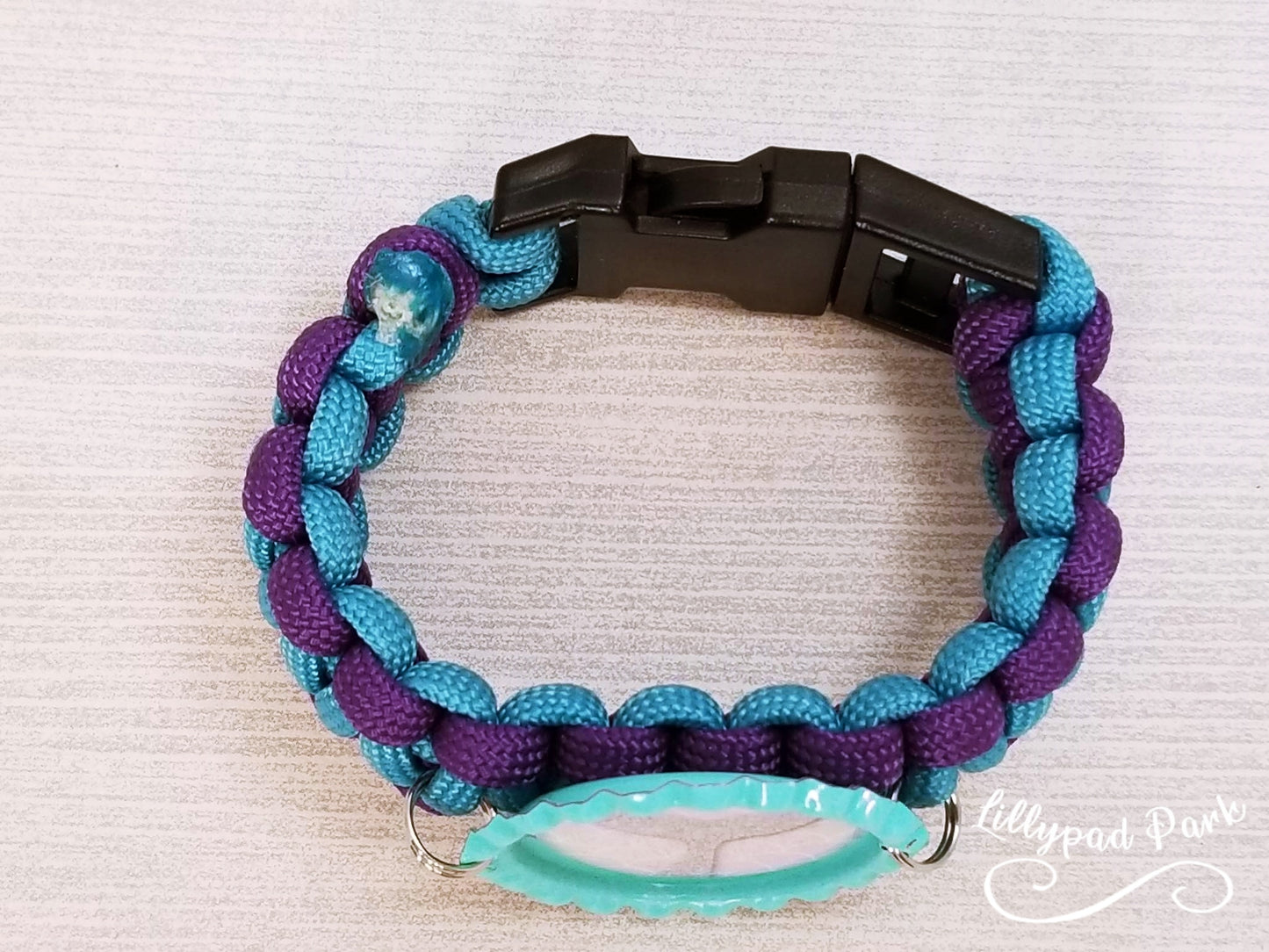 Handmade and hand braided paracord bracelet with bottle cap pendent