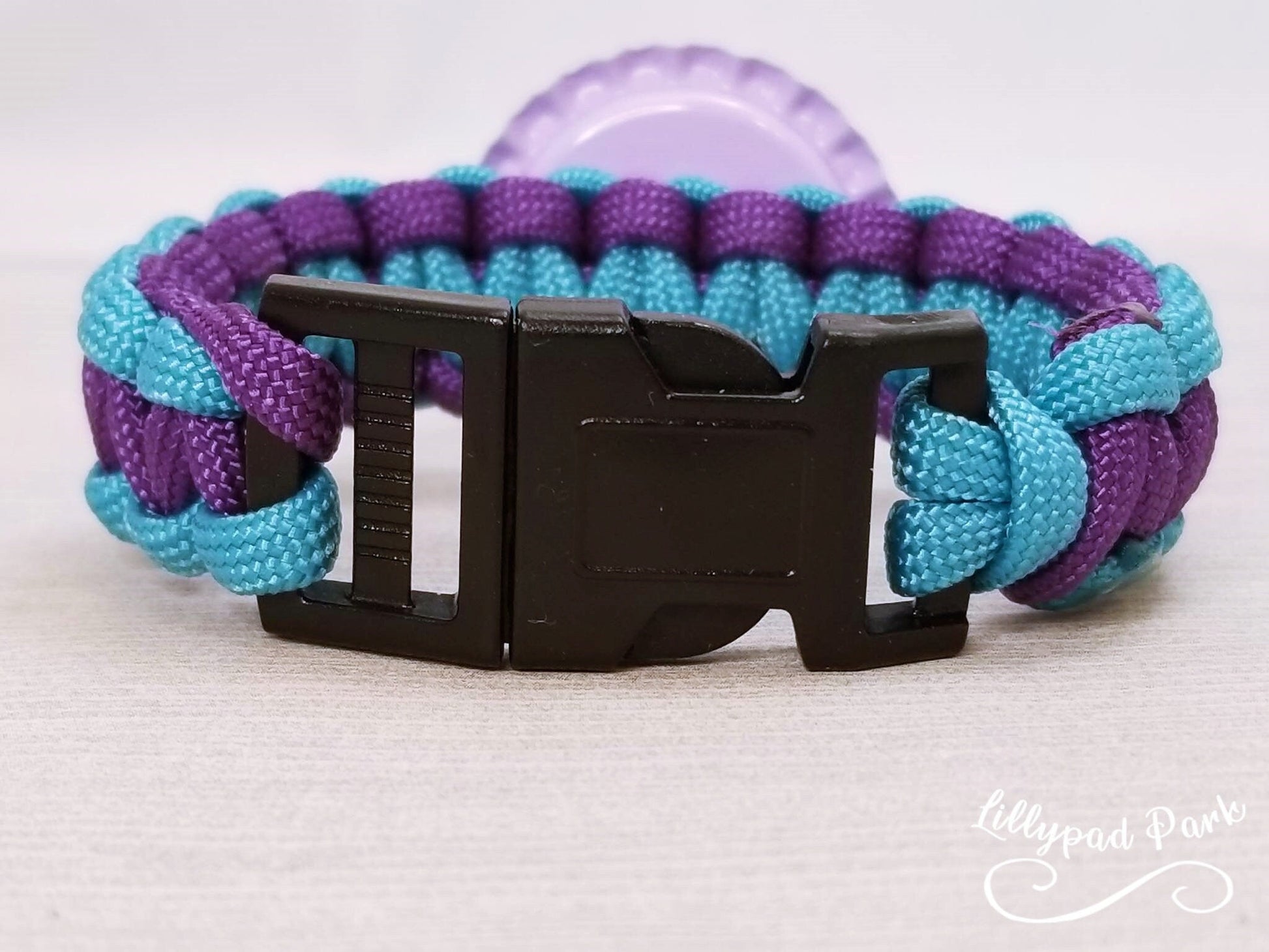 Handmade and hand braided paracord bracelet with bottle cap pendent
