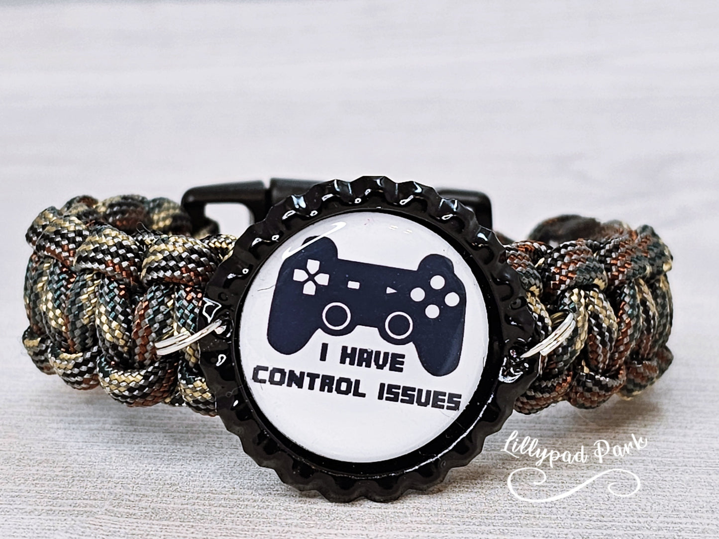 Handmade and hand braided paracord bracelet with bottle cap pendent
