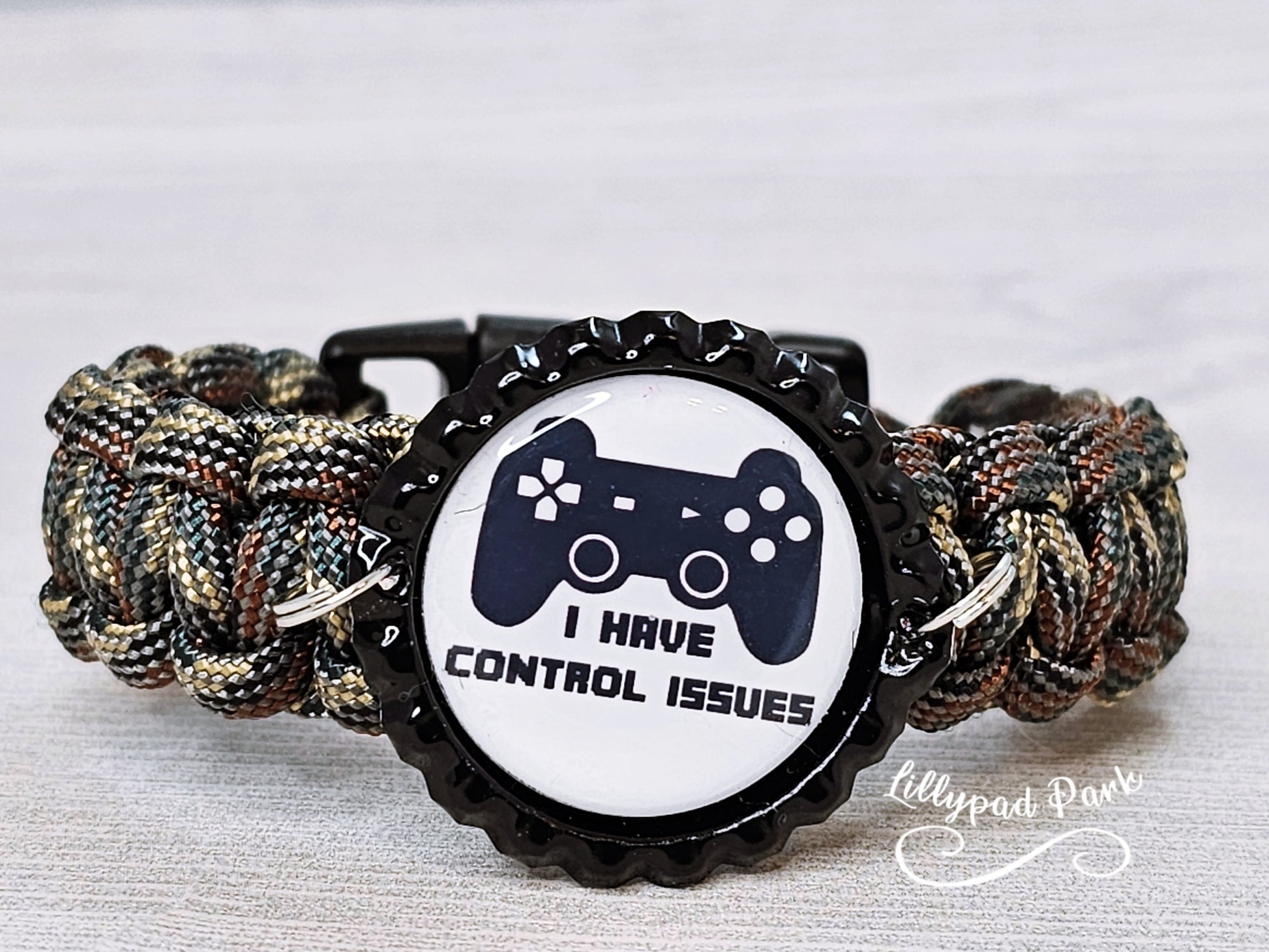 Handmade and hand braided paracord bracelet with bottle cap pendent