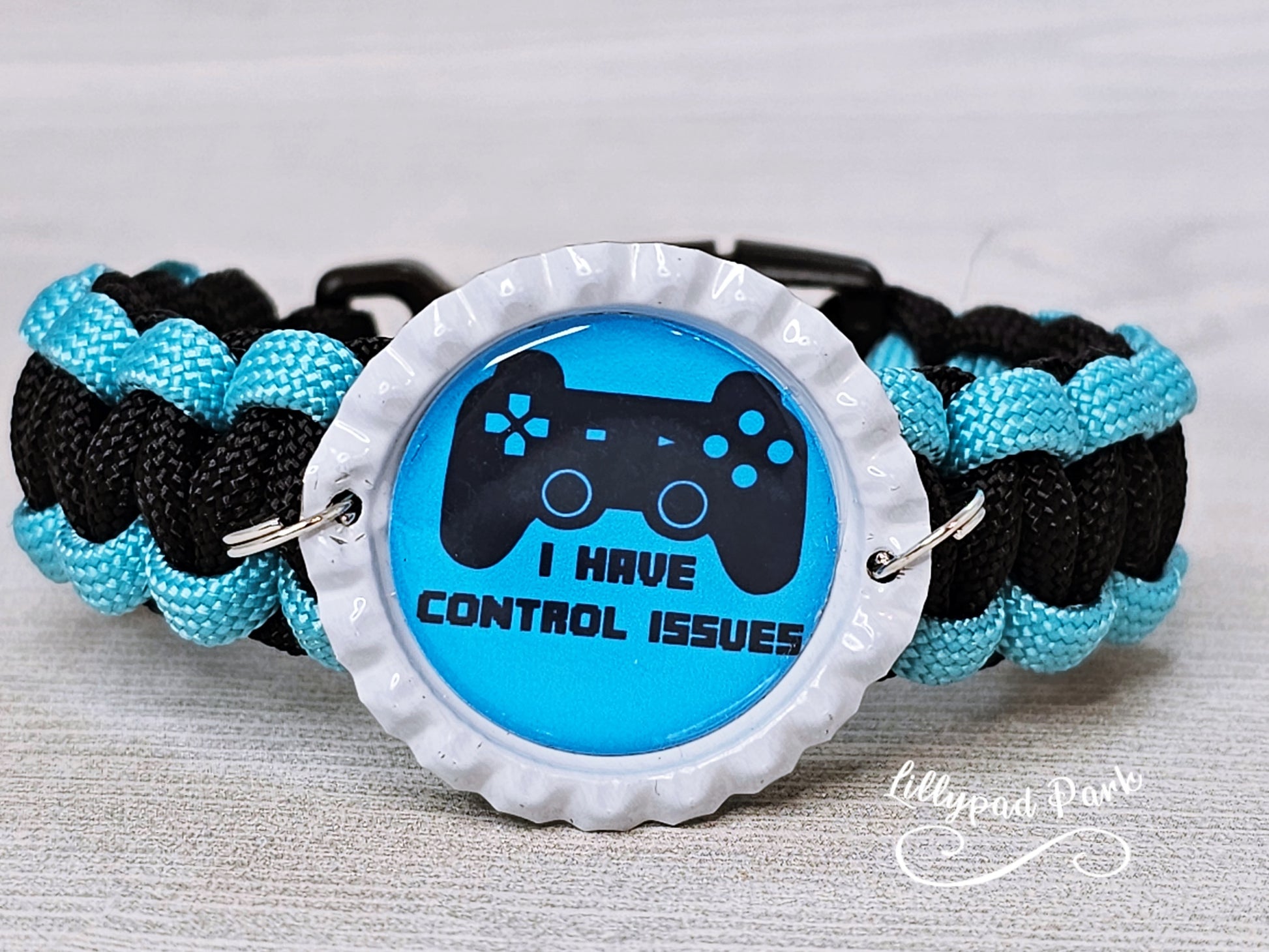 Handmade and hand braided paracord bracelet with bottle cap pendent