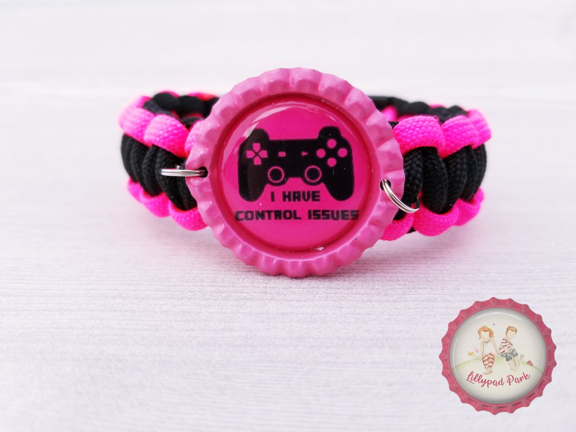 Handmade and hand braided paracord bracelet with bottle cap pendent