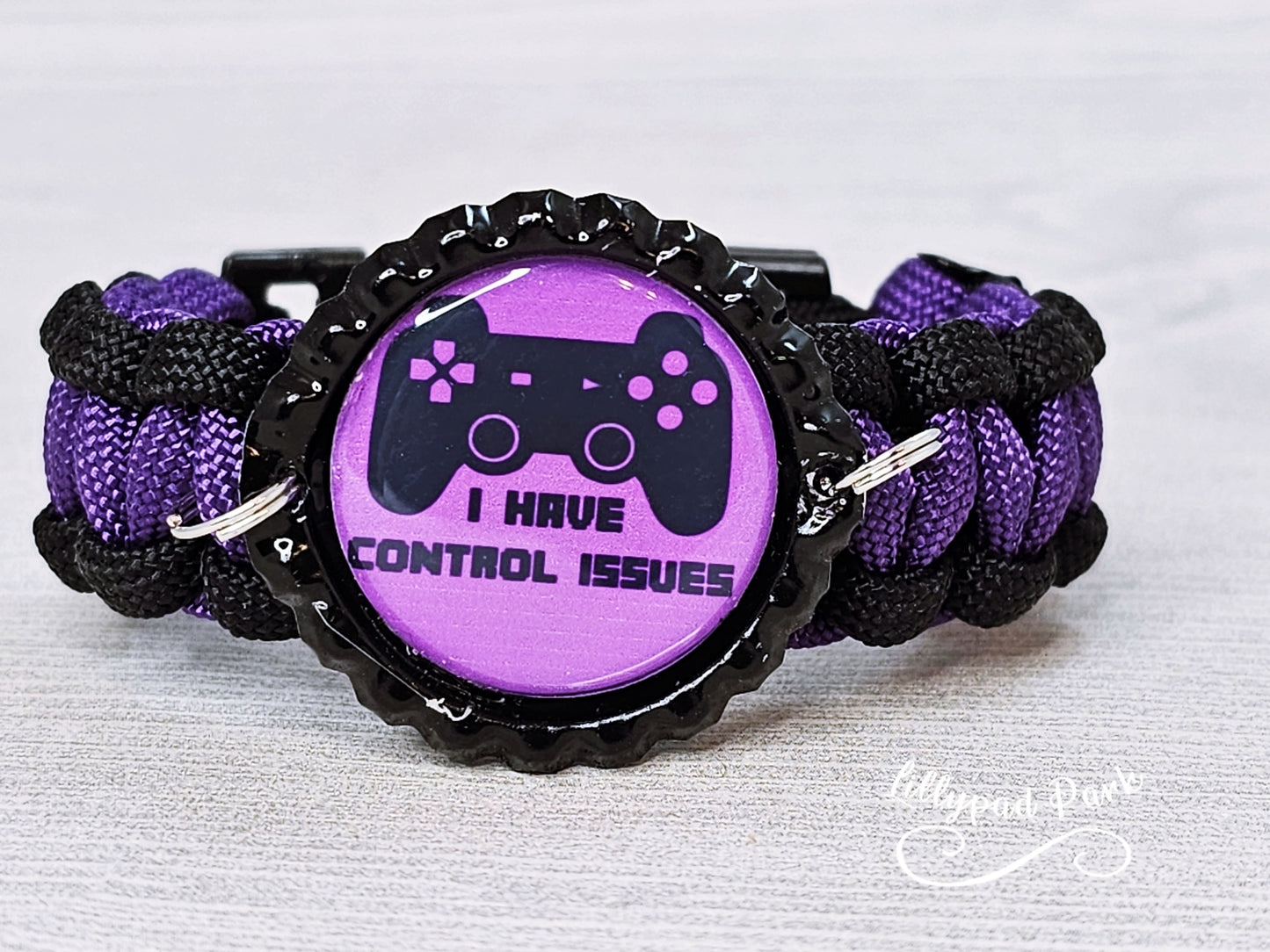 Handmade and hand braided paracord bracelet with bottle cap pendent
