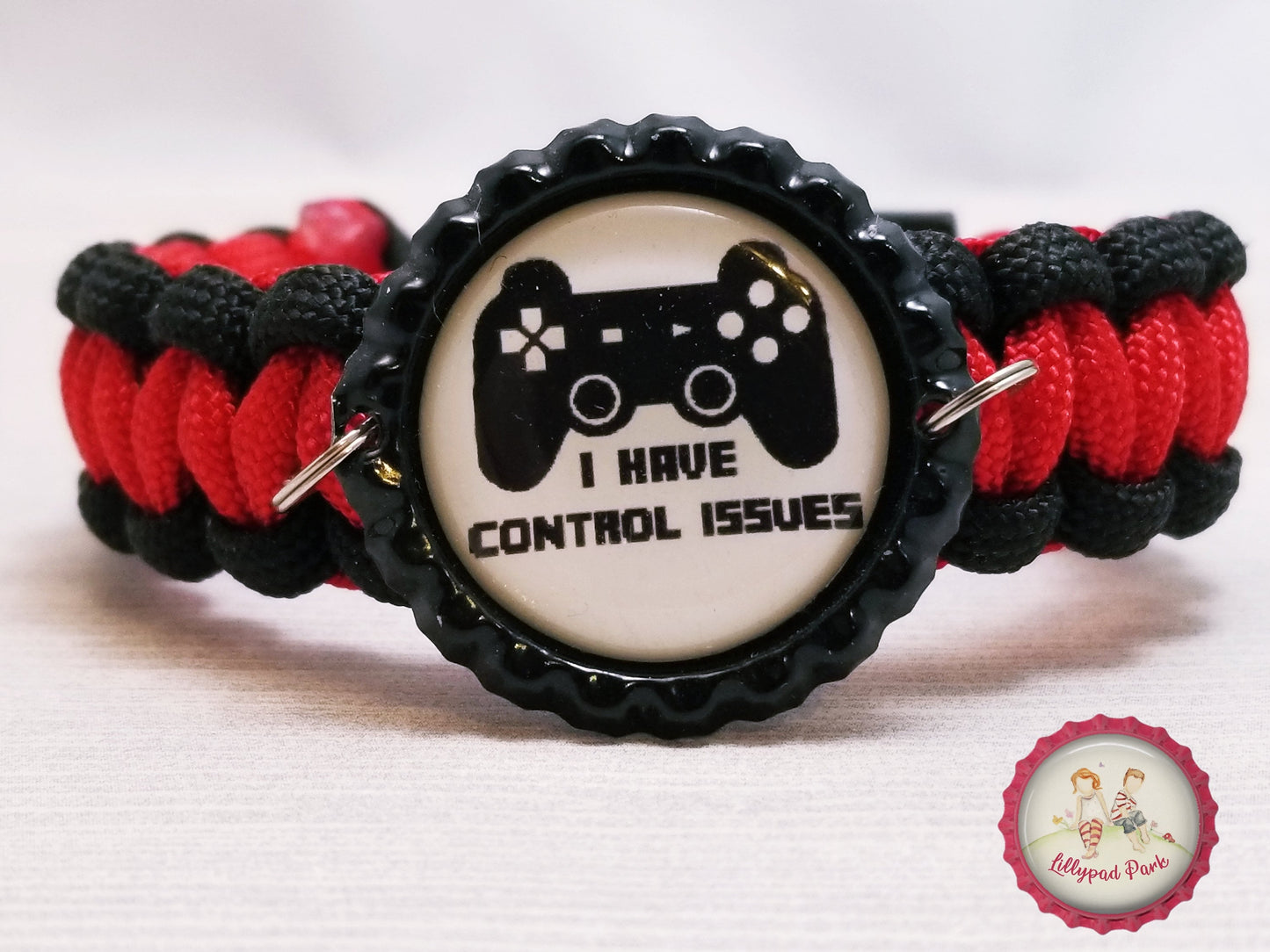 Handmade and hand braided paracord bracelet with bottle cap pendent