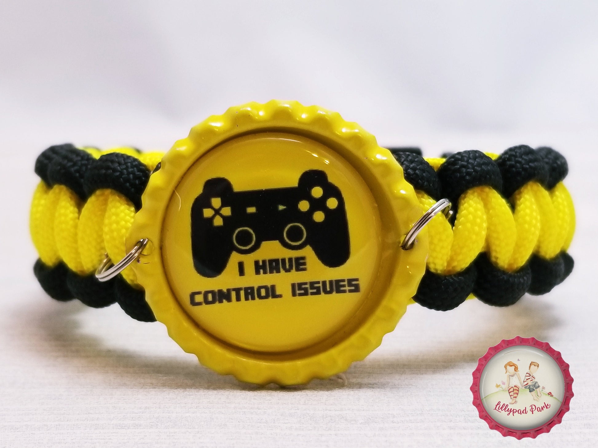 Handmade and hand braided paracord bracelet with bottle cap pendent
