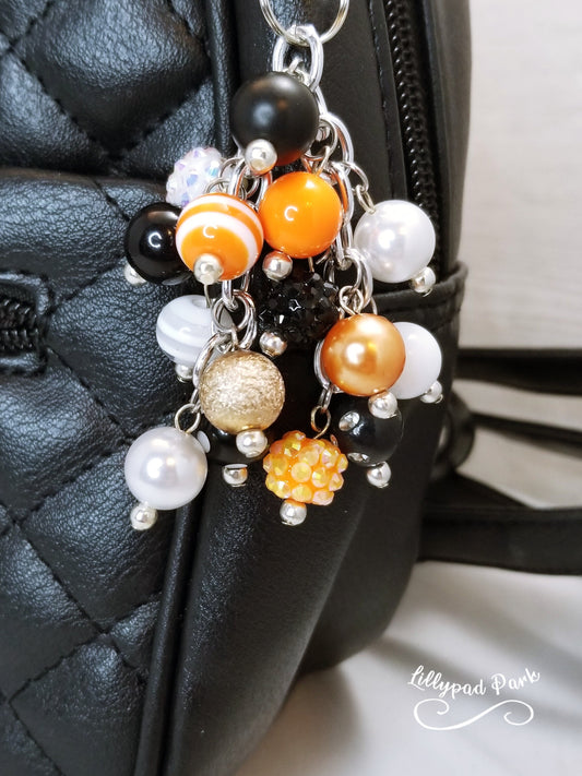 Handmade Beaded Mini Purse Charm or Bag Charm that dangles like a keychain